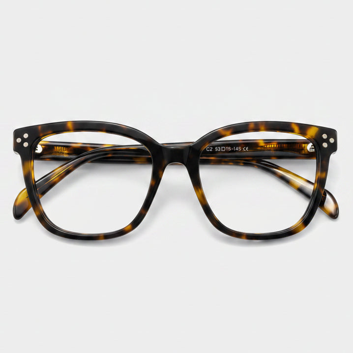 Tortoiseshell eyeglasses on a white background