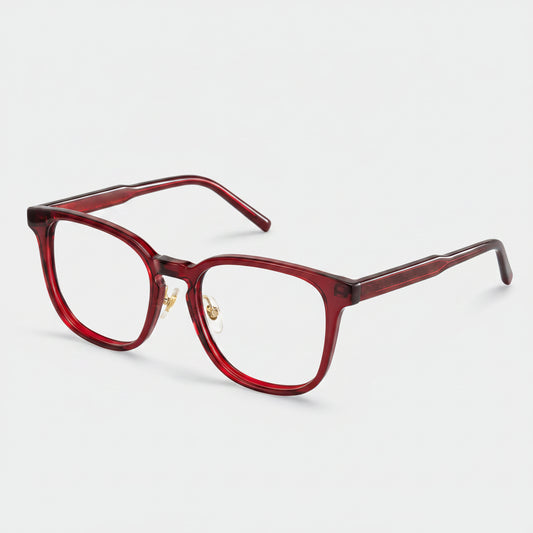 Red eyeglasses on a white background
