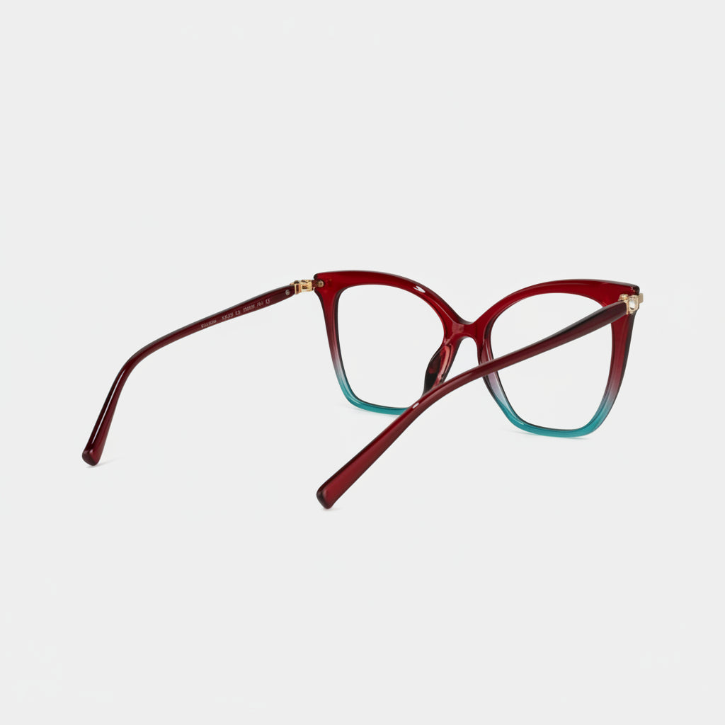 Pair of cat-eye glasses with a maroon frame on a light gray background