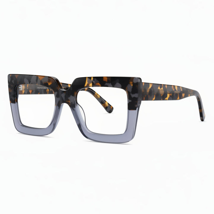 A pair of oversized acetate eyeglasses with a patterned frame design.