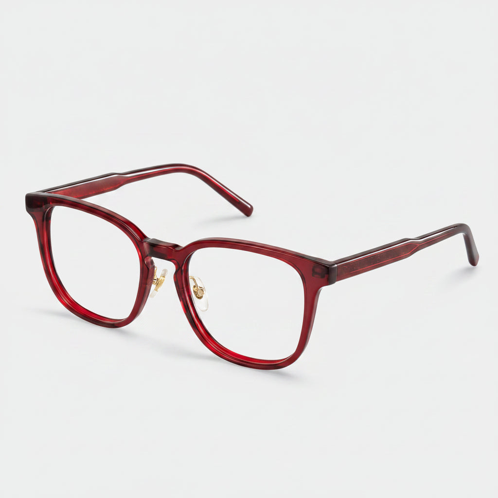 Red eyeglasses on a white background