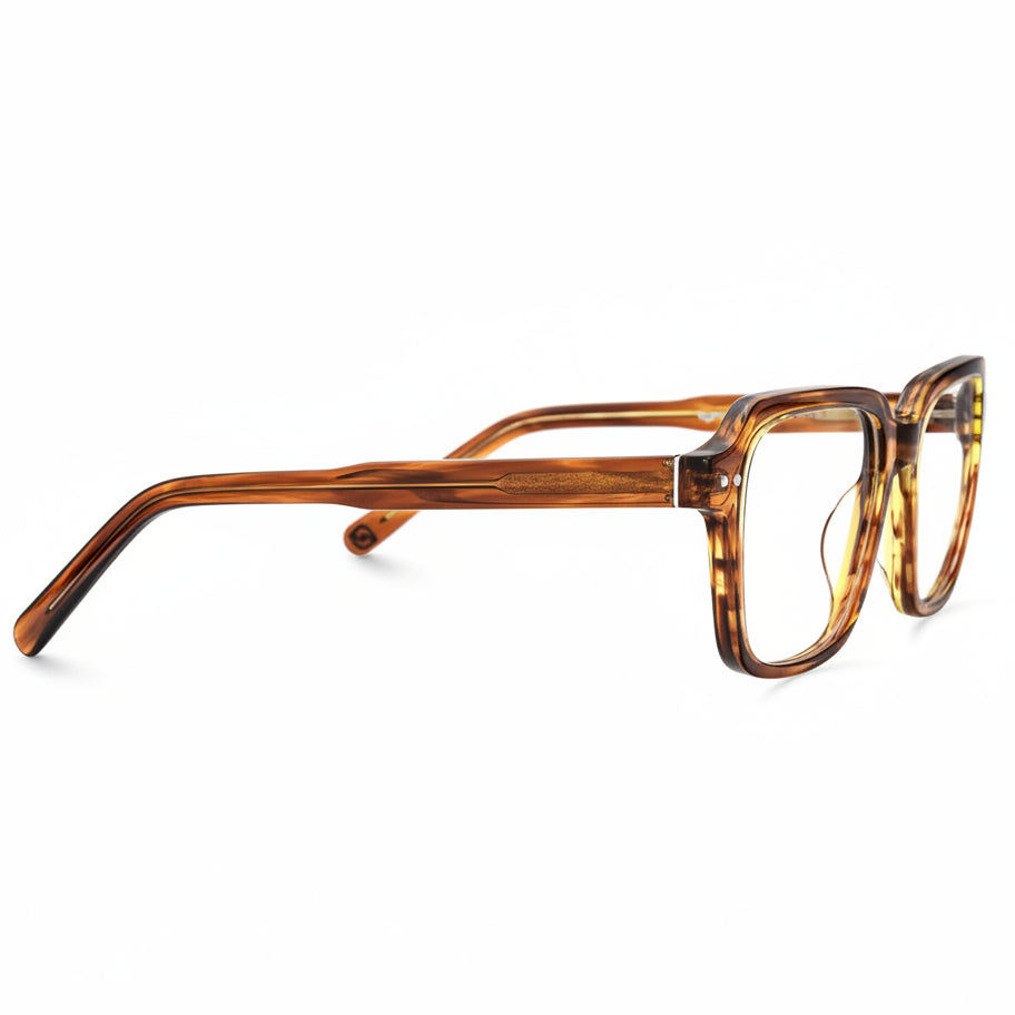 Brown tortoiseshell eyeglasses on a white background