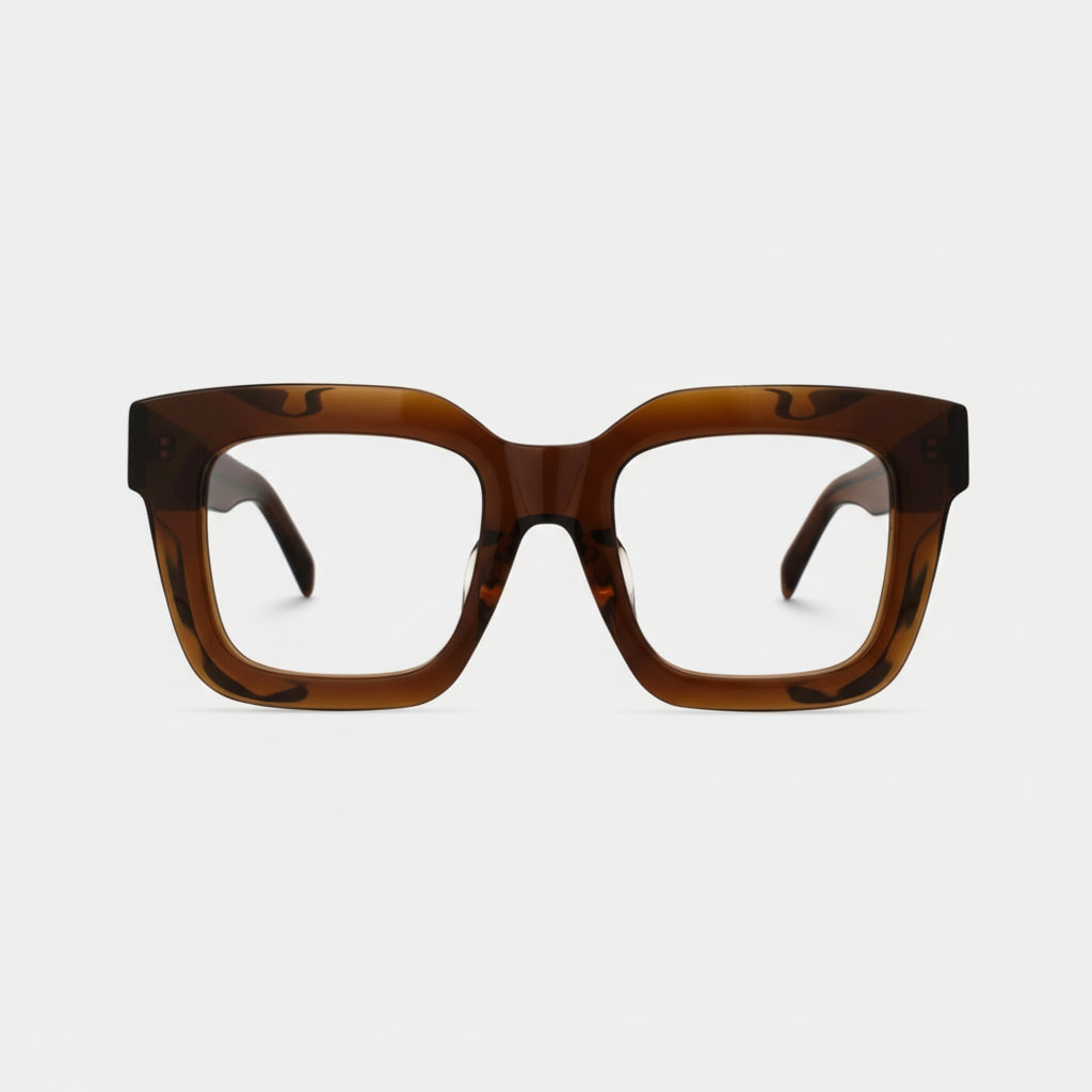 Brown tortoiseshell glasses on a white background